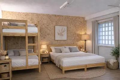 a bedroom with two bunk beds and a window at Villa Agaporni in Senmanat