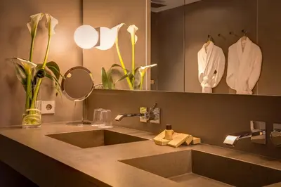 a bathroom with a sink and a mirror at Ohla Eixample in Barcelona