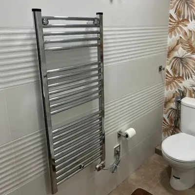 a shower stall in a bathroom with a toilet at La Casa Vella