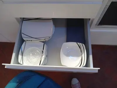 a white shelf with two empty bowls on it at VERSACE 4PACK -SMART HOME- AIR CONDITIONER - GOTIC quarter- PRIVATE STUDIO- Beach 10 minutes in Barcelona