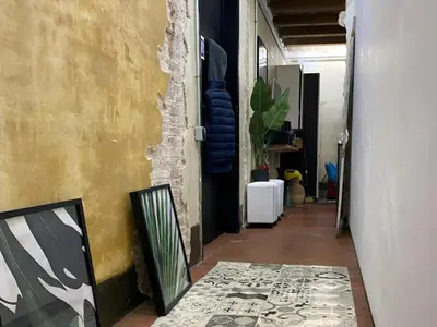 a hallway leading to a room with a hallway at VERSACE 4PACK -SMART HOME- AIR CONDITIONER - GOTIC quarter- PRIVATE STUDIO- Beach 10 minutes in Barcelona