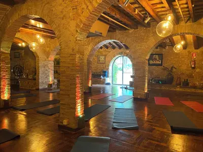 a large room with a lot of yoga mats at Masia Notari Casabona in Vilanova i la Geltrú
