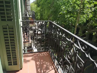 a balcony with a wrought iron railing on a house at ApartEasy mid-term ONLY for VACATIONS stays, BORRELL in Barcelona