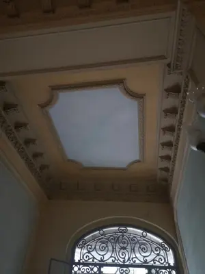 a coffered ceiling with a window in a building at ApartEasy mid-term ONLY for VACATIONS stays, BORRELL in Barcelona