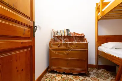 a hallway with a brick wall and stairs at Apartamento céntrico en Poble Sec in Barcelona