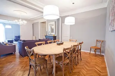 a dining room with a table and chairs at Bcncaliu in Barcelona