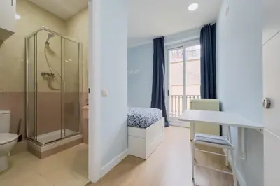a bathroom with a shower and a sink and a toilet at Habitación 5 con baño junto al Palau Güell in Barcelona
