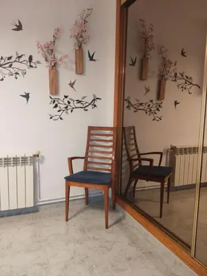 a wall with some dried flowers and a radiator at CORRAL DEL BLANCH, La Tribu del Blanch in Torrellas de Foix