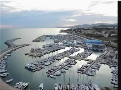 an aerial view of a marina with boats in the water at Apartment Llavaneres II in Sant Andreu de Llavaneres