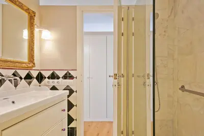 a bathroom with a sink and a shower at Alcam Olimpic in Barcelona