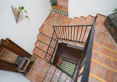 an overhead view of a brick stair case at Hotel Can Missé in Collbató