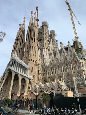 a large building with a crane on top of it at Luxury Apartment Barcelona in Barcelona