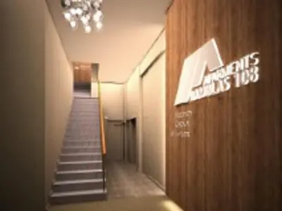 a staircase in a building with a sign on the wall at Aparthotel Rambla108 in Barcelona