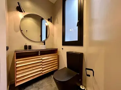 a bathroom with a sink and a mirror at BarcelonaForRent Plaza Sagrada Familia in Barcelona