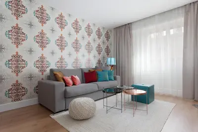 a living room with a couch and a table at Passeig de Gracia Apartment in Barcelona