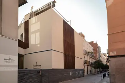 a building on a street in a city at Feelathome Poblenou Beach Apartments in Barcelona