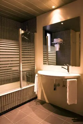 a bathroom with a tub and a sink and a shower at Barcelona House in Barcelona