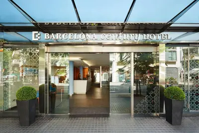 a entrance to a building with a sign on it at Barcelona Century Hotel in Barcelona