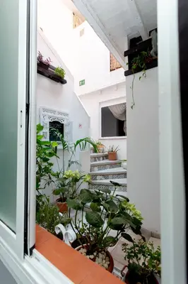 a view from a window of a balcony with plants at Easy Sants by Bossh! Hotels in Barcelona