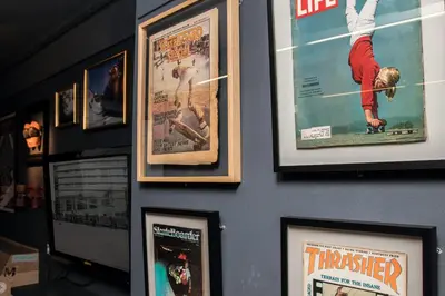 a wall with framed movie posters on it at Sant Jordi Hostels Sagrada Familia in Barcelona