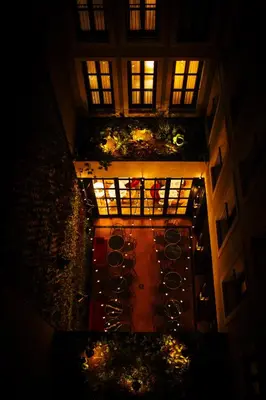a large building with lights in front of it at Wittmore Hotel GL- Adults Only, Small Luxury Hotels in Barcelona