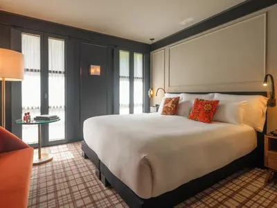 a electronic device sitting on top of a table at Wittmore Hotel GL- Adults Only, Small Luxury Hotels in Barcelona