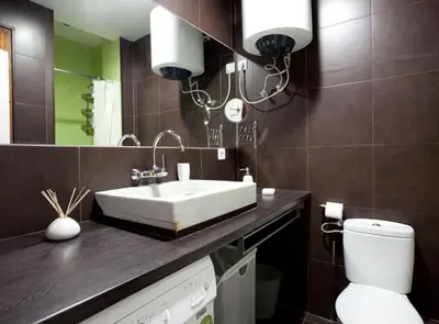 a bathroom with a sink and a toilet at Borrell · Near ramblas in Barcelona