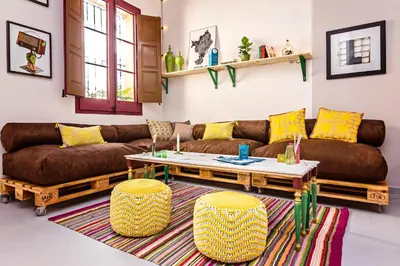 a living room with a couch and a coffee table at Sweett - Raco in Barcelona