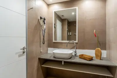a bathroom with a sink and a mirror at AB Sagrada Familia - Gaudí in Barcelona