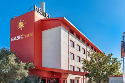 a building with a hotel sign on top of it at Hotel Basic in Vilafranca del Penedès