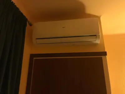 a air conditioner on a wall in a room at Hostal Bonavista in Calella
