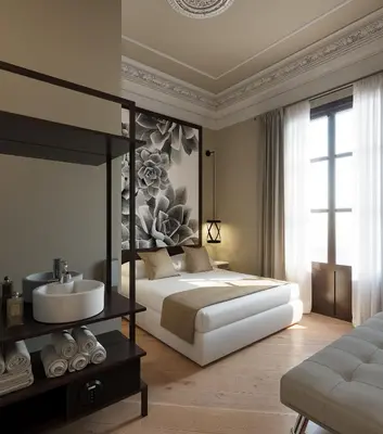 a bedroom with a bed and a sink and a sink at Hostal Central Barcelona in Barcelona