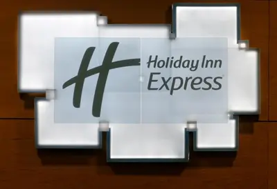 a sign for a holiday inn express on a table at Holiday Inn Express Sant Cugat by IHG in Sant Cugat del Vallès