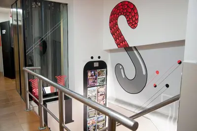 a store with a samsung sign on the wall at Be Ramblas Guest House in Barcelona