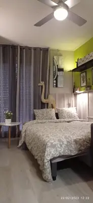 a bedroom with a bed with a dinosaur headboard at Apartment Oliver in Calella