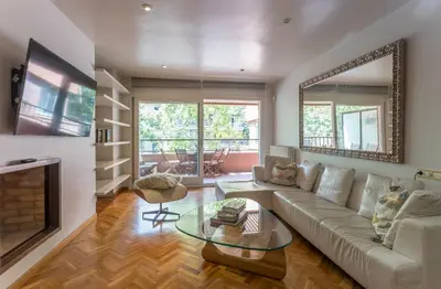 a living room with a couch and a fireplace at Apartment Barcelona Rentals - Classic Bonanova Apartment in Barcelona