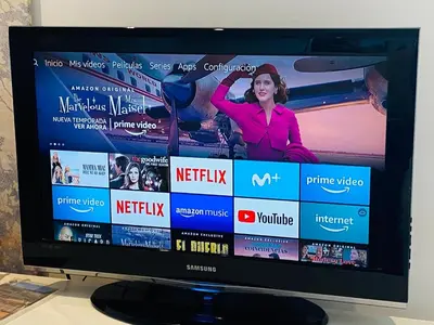 a television screen with a woman on a website at Panoramic Apartments Sitges in Sitges