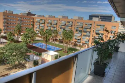 an apartment balcony with a view of a building at Barcelona Olympic Apartment in Barcelona