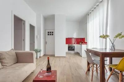 a living room with a couch and a table at Matarolux 7 in Mataró