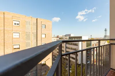 a balcony with a view of a building at ApartEasy - Port Barcelona in Barcelona