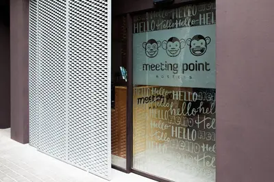 a window of a dressing room with writing on it at Meeting Point Hostels in Barcelona