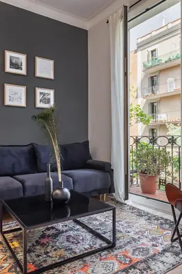 a living room with a couch and a table at Sagrada Familia V in Barcelona