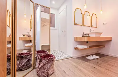 a bathroom with a sink and a mirror at Sweett - La Pedrera - Paseo de Gracia in Barcelona