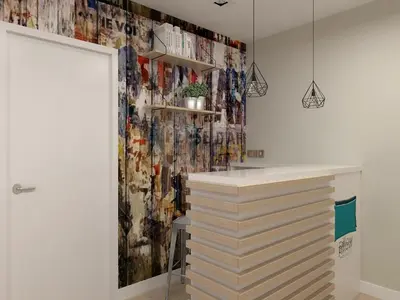a room with a wall covered in photos at BYPILLOW Wander in Barcelona
