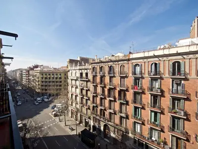 a view of a city street with buildings at Suites4days Gaudi Eixample in Barcelona