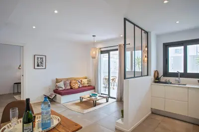 a living room with a couch and a table at Destino Sitges in Sitges