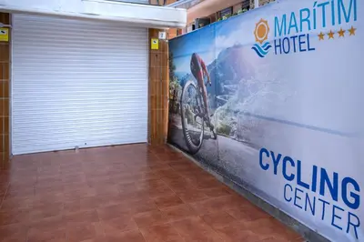 a garage with a building center sign on the wall at GHT Maritim in Calella