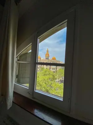 an open window with a view of a building at Passeig de Gracia Studio Loft in Barcelona