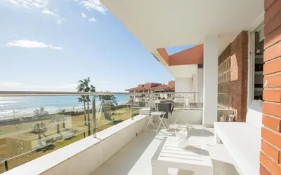a balcony with a view of the ocean at Gava Beach 1st Line in Gavà