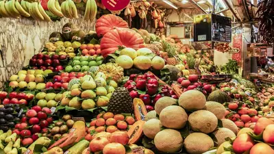a market filled with lots of fruits and vegetables at Catalunya Casas Modern and spacious with private pool close to BCN in Senmanat